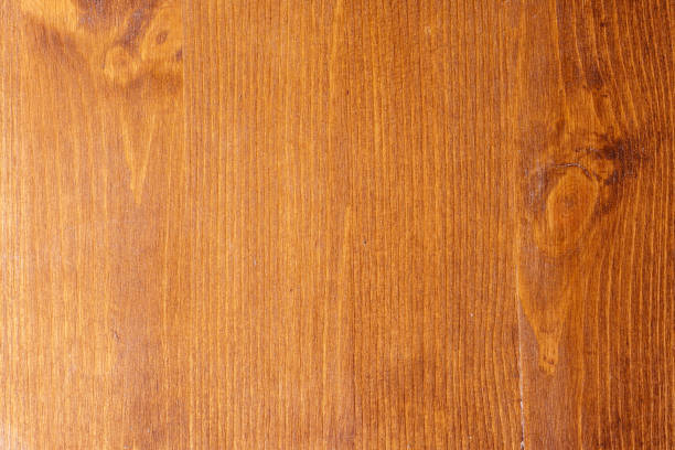 istock Dark brown  wooden textured  background. 936332748
