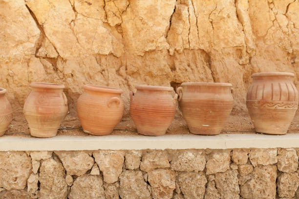 istock many large clay pots standing in a row 936333746