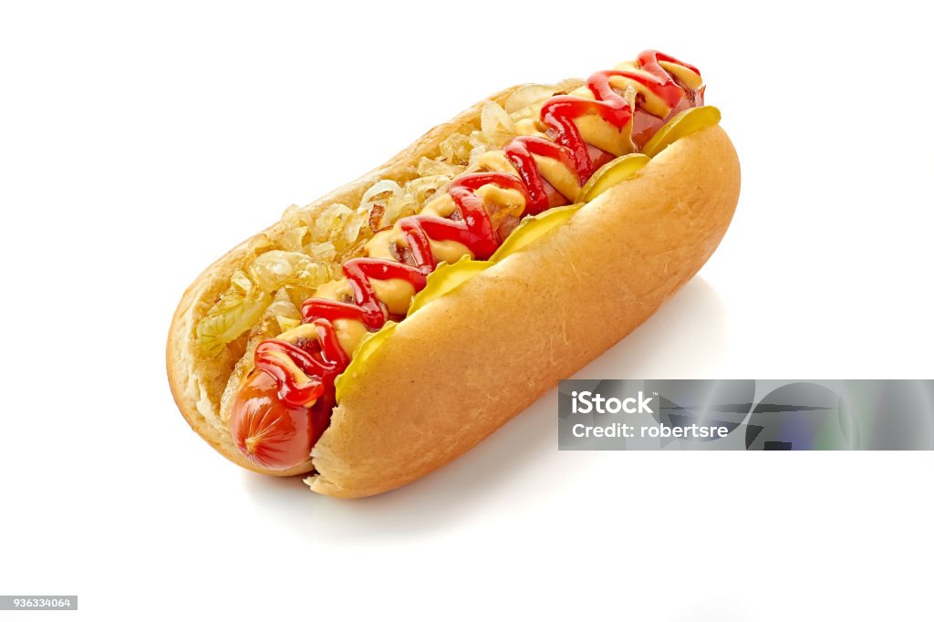 Hot dog with fried onion and cucumber on white Hot dog with fried onion and cucumber isolated on white Hot Dog Stock Photo