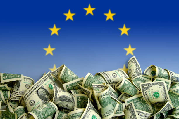 istock European Union flag with US Dollars 936334772