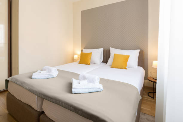 istock Interior of a hotel bedroom with double bed 936334850