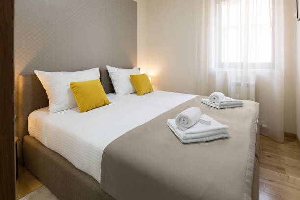 istock Interior of a hotel bedroom with double bed 936335928