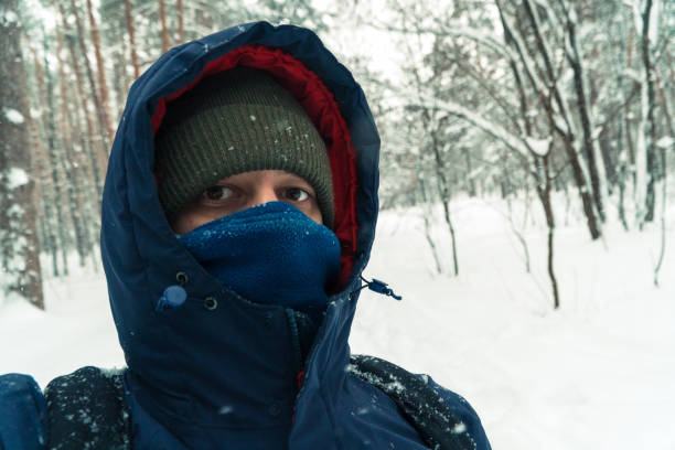 istock Winter. The man's face is covered with snow 936337012