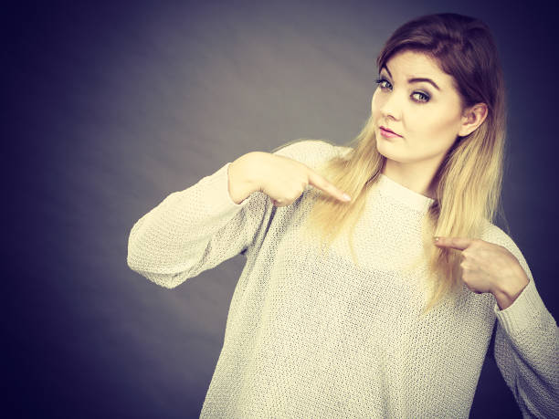 istock Confused woman pointing at herself 936338068