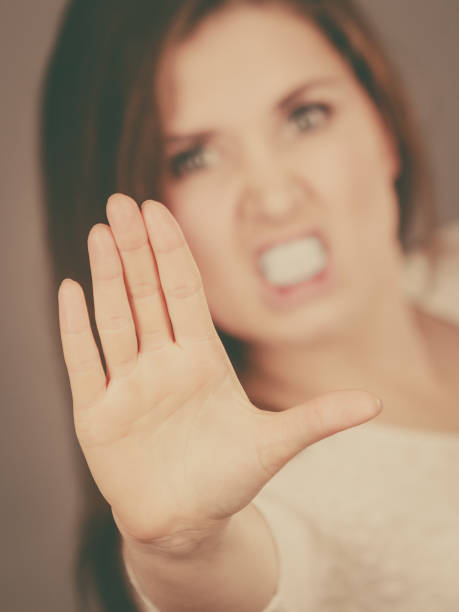 istock Angry apodicticity woman showing stop with hand 936338820
