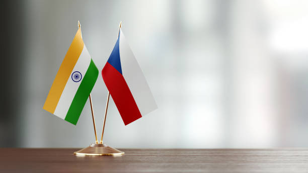 istock Indian And Czechoslovakian Flag Pair On A Desk Over Defocused Background 936345914