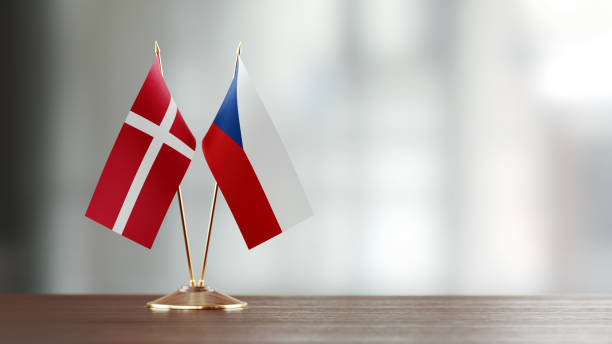 istock Danish And Czechoslovakian Flag Pair On A Desk Over Defocused Background 936346402