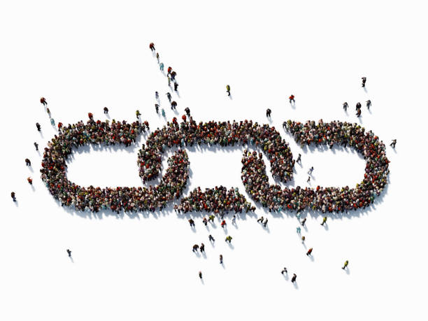 human crowd forming a chain symbol: bonding and social media concept - link imagens e fotografias de stock