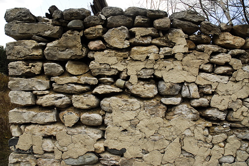VERY old stone wall of a long, LONG abandoned home in Michigans Upper Peninsula