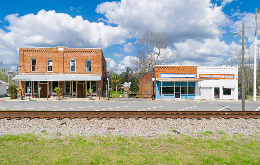 An empty row of stores on the main street in historic Greenville, Florida.