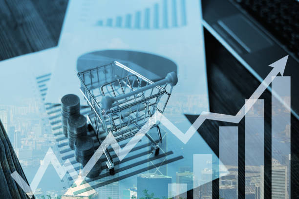 istock Double exposure of coin stack and notebook laptop computer with financial graph on white paper business planning vision and finance analysis concept. 936350318