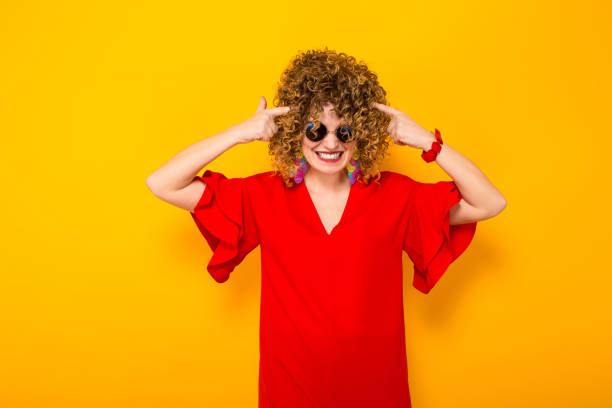 istock Attractive woman with short curly hair 936354450