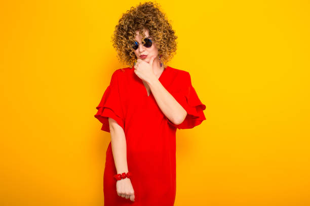 istock Attractive woman with short curly hair 936354570