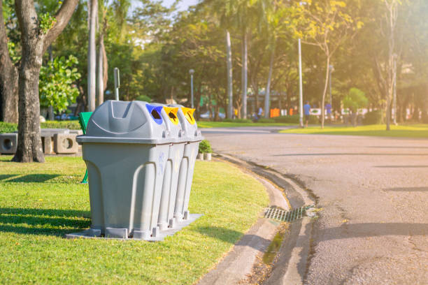 Three type of trash bin in the park.