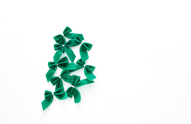 istock St Patricks Day  green bows over a white background 936355244