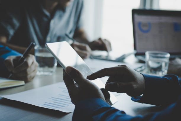 istock businessman use tablet and meeting, concept as teamwork and brainstorming 936356008