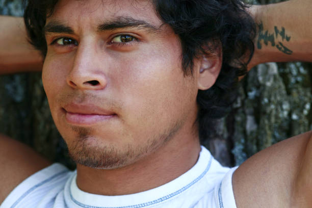 istock Close-up of young hispanic man. 936358112