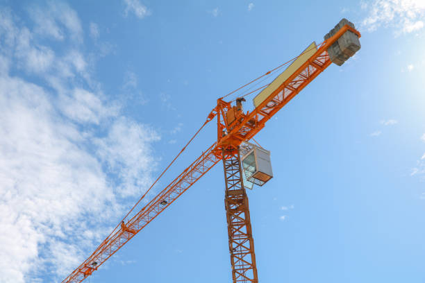 istock Tower crane industry, Construction buildings in site on sky background 936364994