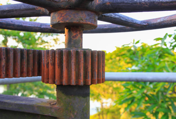 istock rusty gear toothed wheels old water valve select focus with shallow depth of field. 936365322