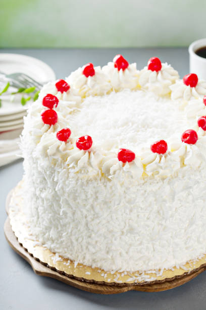 istock Coconut cake with maraschino cherries 936374482
