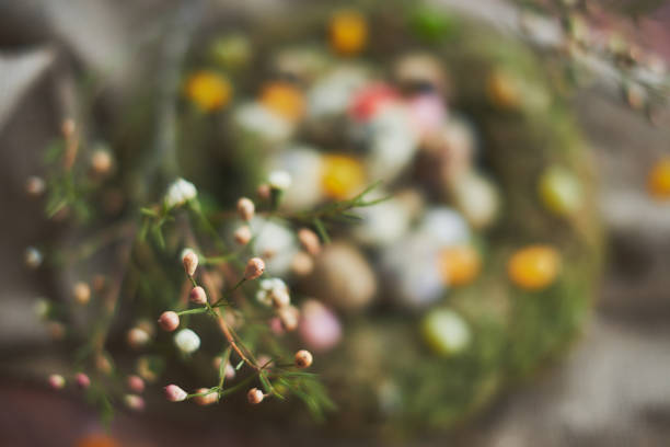 istock Easter arrangement with quail eggs and moss 936375242