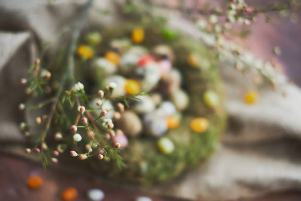 istock Easter arrangement with quail eggs and moss 936375248