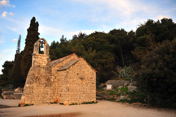 istock Old brick chapel on sunset, Croatia 936375658