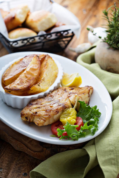 istock Grilled fish with roasted potatoes 936377222