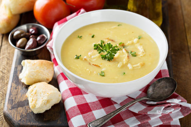 istock Creamy lemon chicken soup 936378334
