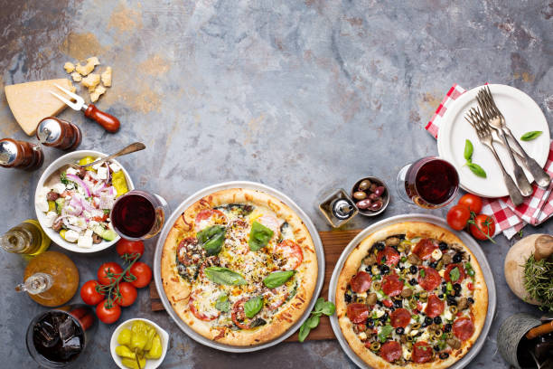 istock Margherita and pepperoni pizza with basil 936379626