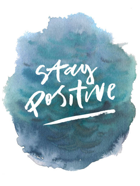 istock Blue sea water watercolor ink hand drawn stroke isolated paper grain texture spot on white background for design, decoration. Stay positive inscription 936379760