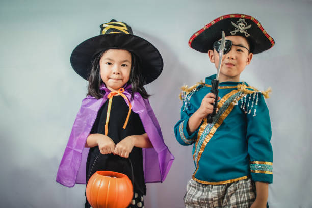 istock Happy brother and sisters on Halloween 936383930