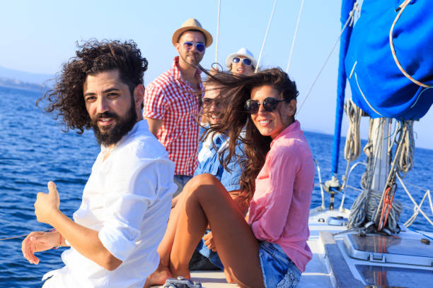 istock Young people traveling with an yacht 936385124