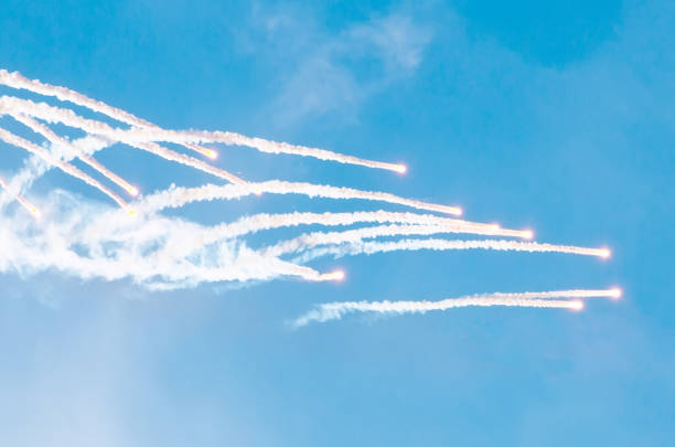 istock Launching rockets from the ground and burning in the sky. 936386374