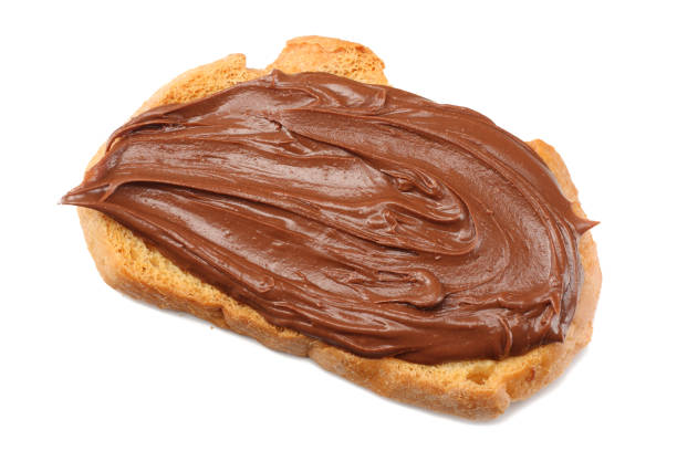 istock Slice of bread with chocolate cream isolated on white background 936387734
