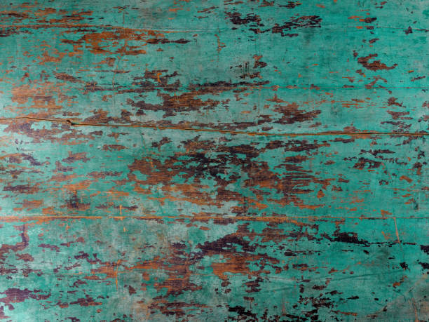 istock Old grungy turquoise coloredwooden board background. 936387958