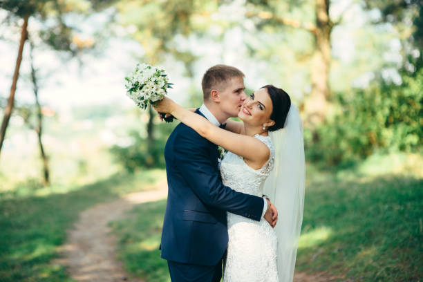istock Happy bride on a walk in the park 936390876