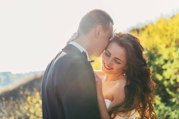 istock Just married couple walking in nature 936391648