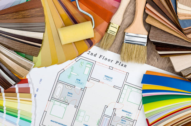 istock House plan with samples and painting tools on wooden table 936391836
