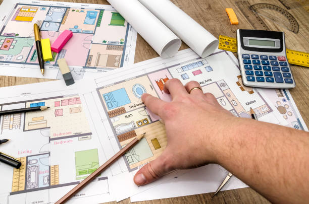 istock Architect reviewing and showing blueprint. architecture sketch. 936392602