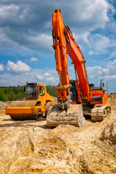 istock Road construction machinery in construction of highway 936392710