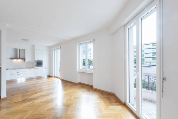 istock Kitchen in newly renovated open space with wooden floors 936399172