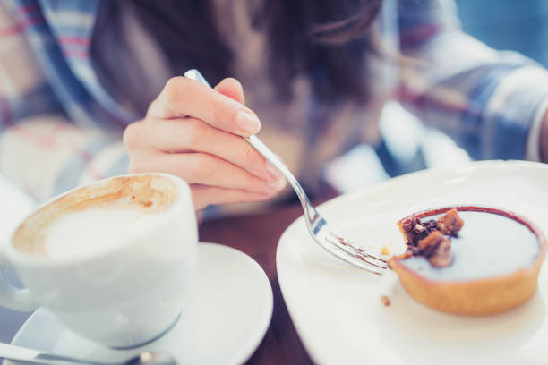 istock Young woman enjoying coffee break 936399560