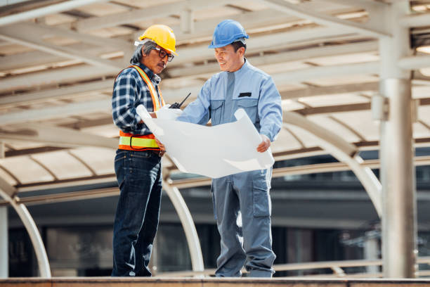 istock Engineer meeting,discussion with construction blueprint on site work,Business man meeting 936399634