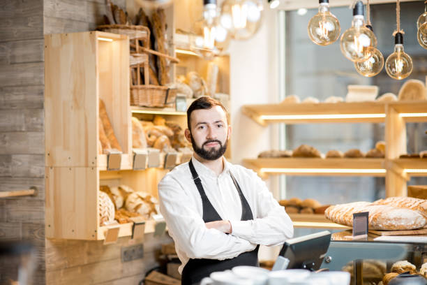 istock Seller in the bread store 936399724