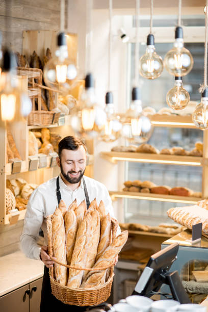 istock Seller in the bread store 936400216