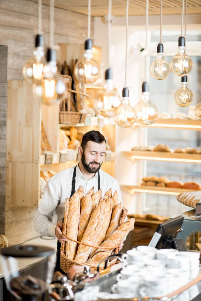 istock Seller in the bread store 936400292