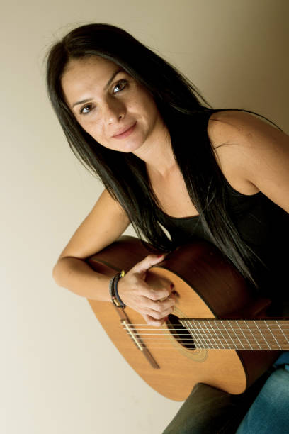 istock Girl with Guitar 936400322