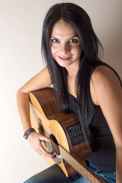 istock Girl with Guitar 936400846