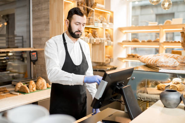 istock Seller in the bread store 936401016